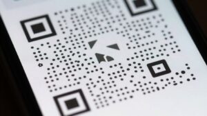 Smartphone displaying a QR code. Offline QR Code Generator